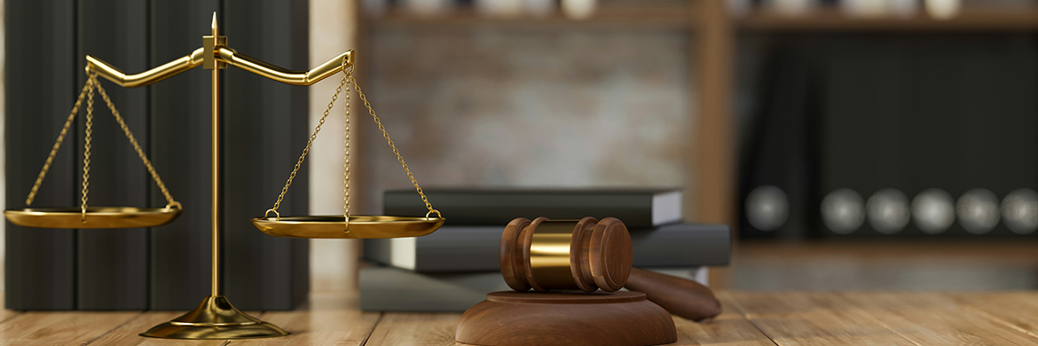 Gavel and scales on a desk