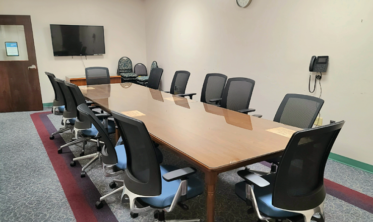 Conference Room interior showing long table and chairs around the table